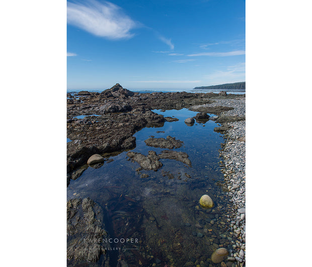 Fine art luxury  nature landscape photography Rocks and tidal pools along rugged beach on Vancouver Island.