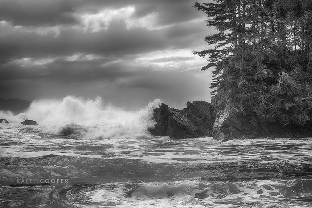 Fine art luxury nature landscape photography Black and white image of crashing waves on rocky ocean island on West Coast Vancouver Island in British Columbia